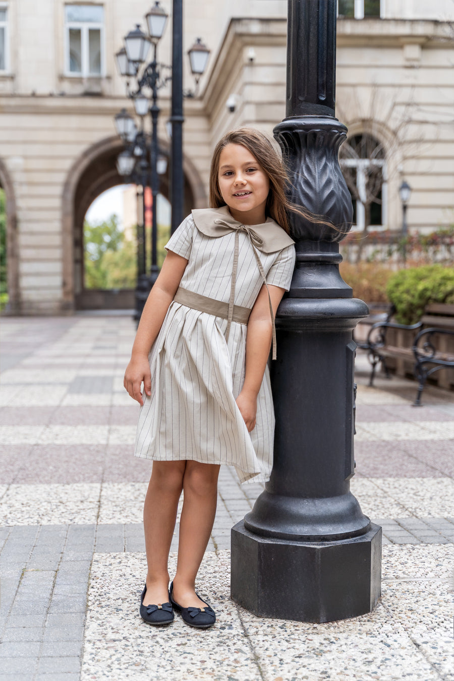 Girl’s cotton dress in a soft cream shade