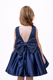 Dark Blue Satin Girls’ dress embellished with a ribbon