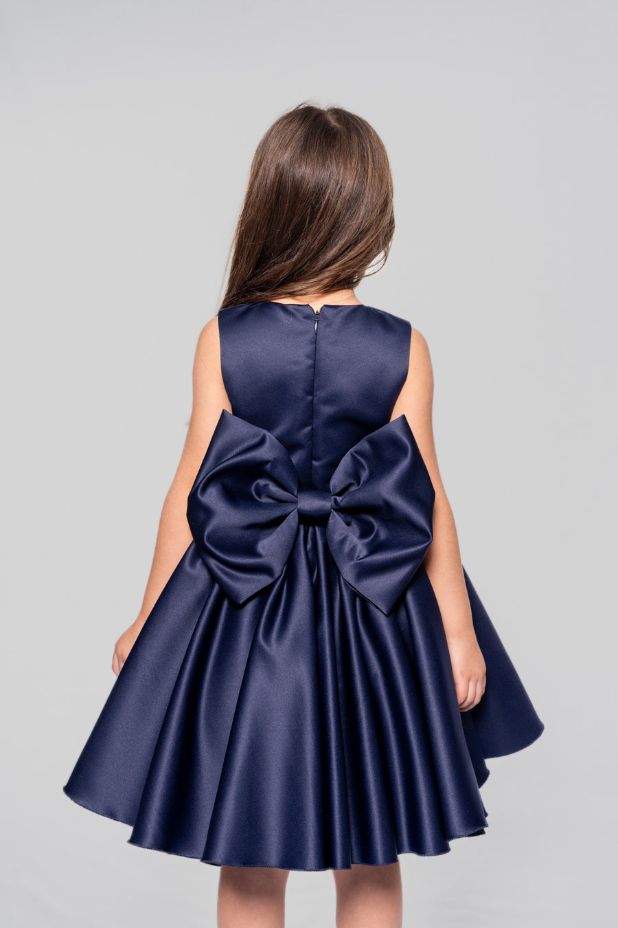 Dark blue satin dress with a ribbon