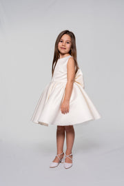 White satin dress with ribbon on the back